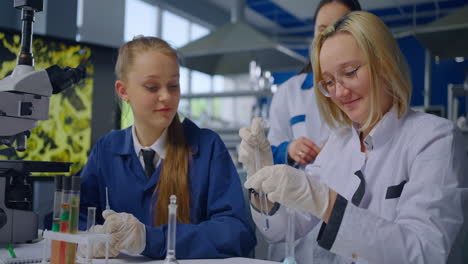 students and teacher in a science laboratory