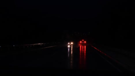 night road rain. abstract bokeh background from car headlights