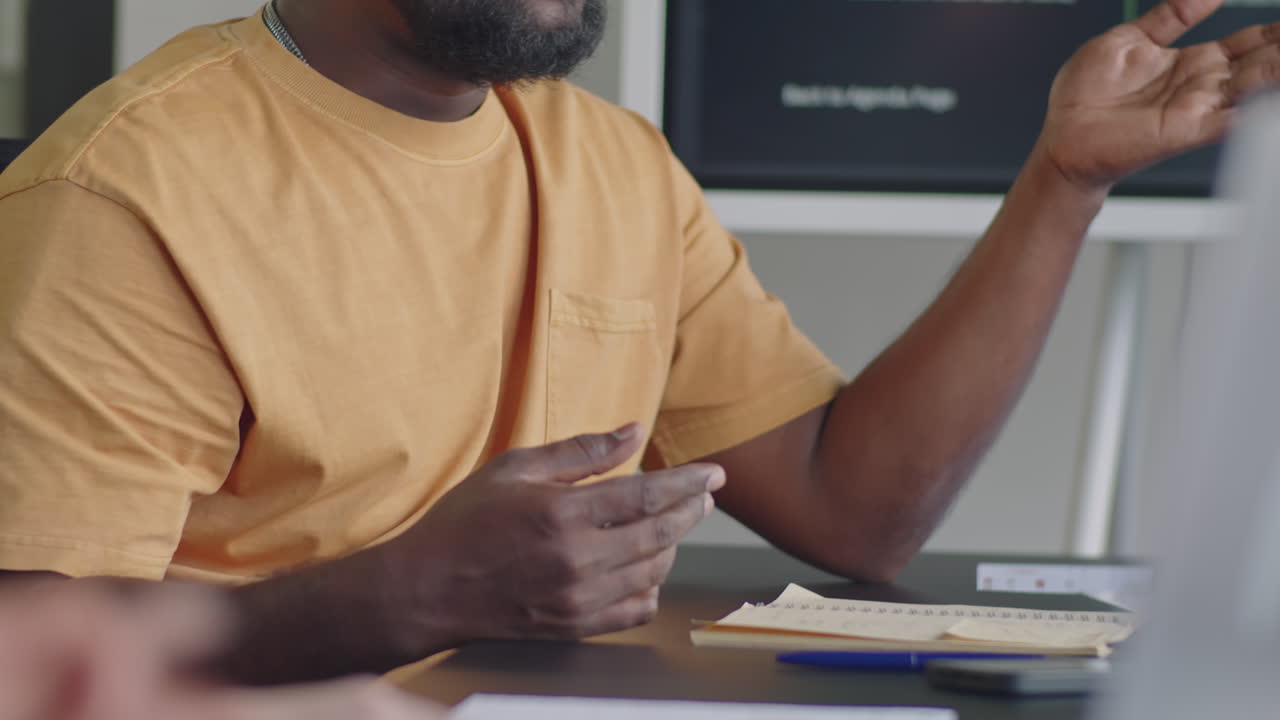 Man Speaking with Female Colleague on Business Meeting