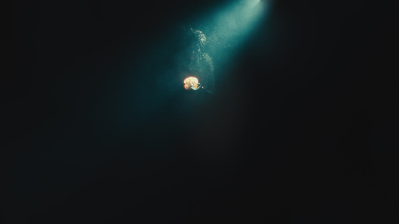 A creepy witch during the night storm