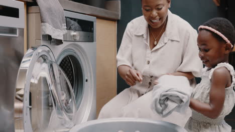 Mom,-child-smile-and-teaching-laundry-together