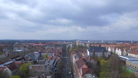 Great-aerial-top-view-flight-German-Street-in-Berlin-City-at-cloudy-day,-district-Steglitz