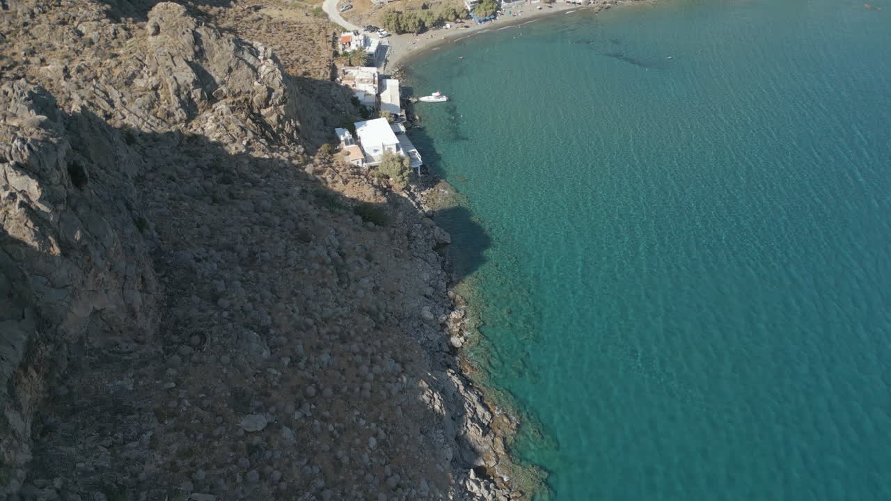 Rugged Cliffs Near Lentas Crete Greece Drone Birdseye View Track Forward 4K 60FPS