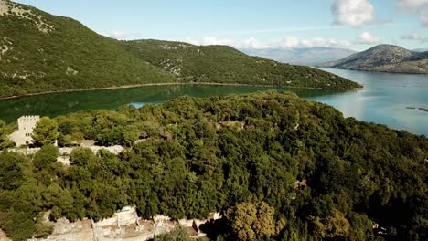 drone view of butrint acheological site, albania, europe reveal of the entire site