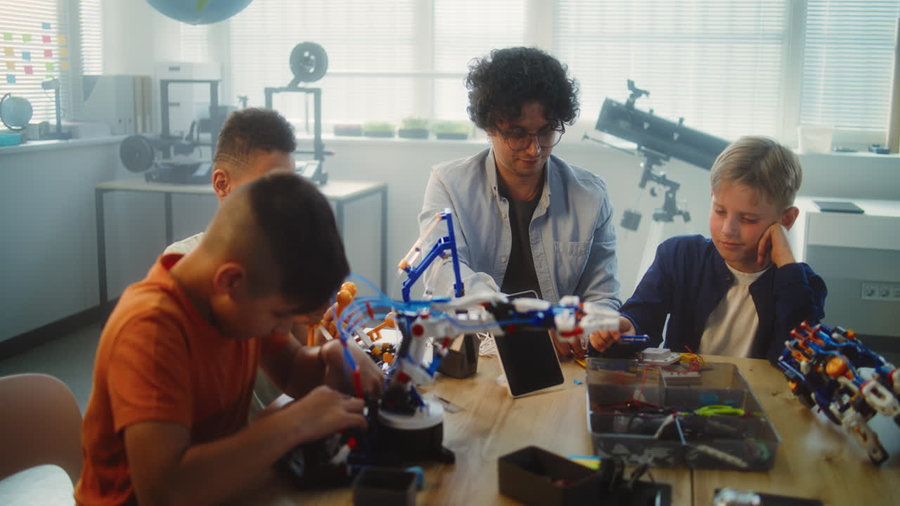 Children learning robotics in class
