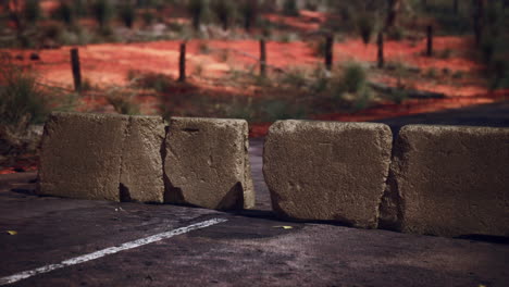 old rusted concrete road barrier blocks