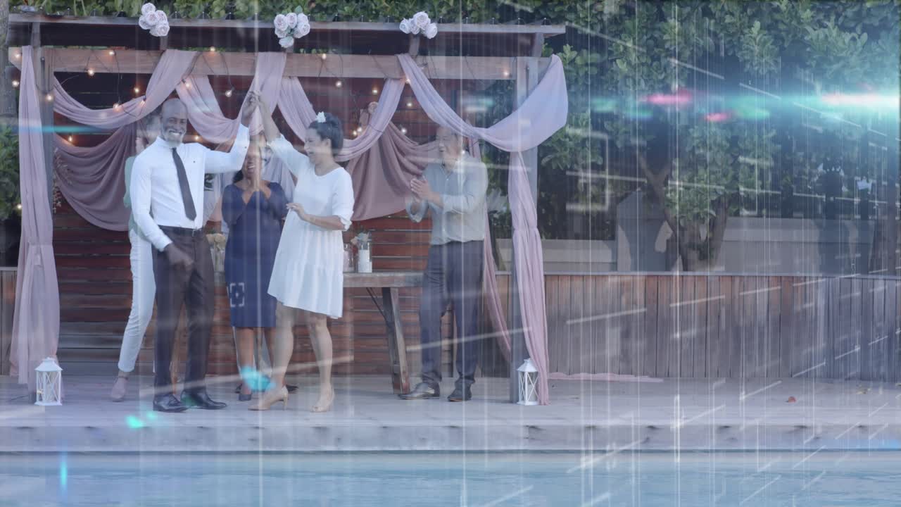 Wedding groom placing ring, couple kissing, sealing vows on poolside pergola, overlays crossing