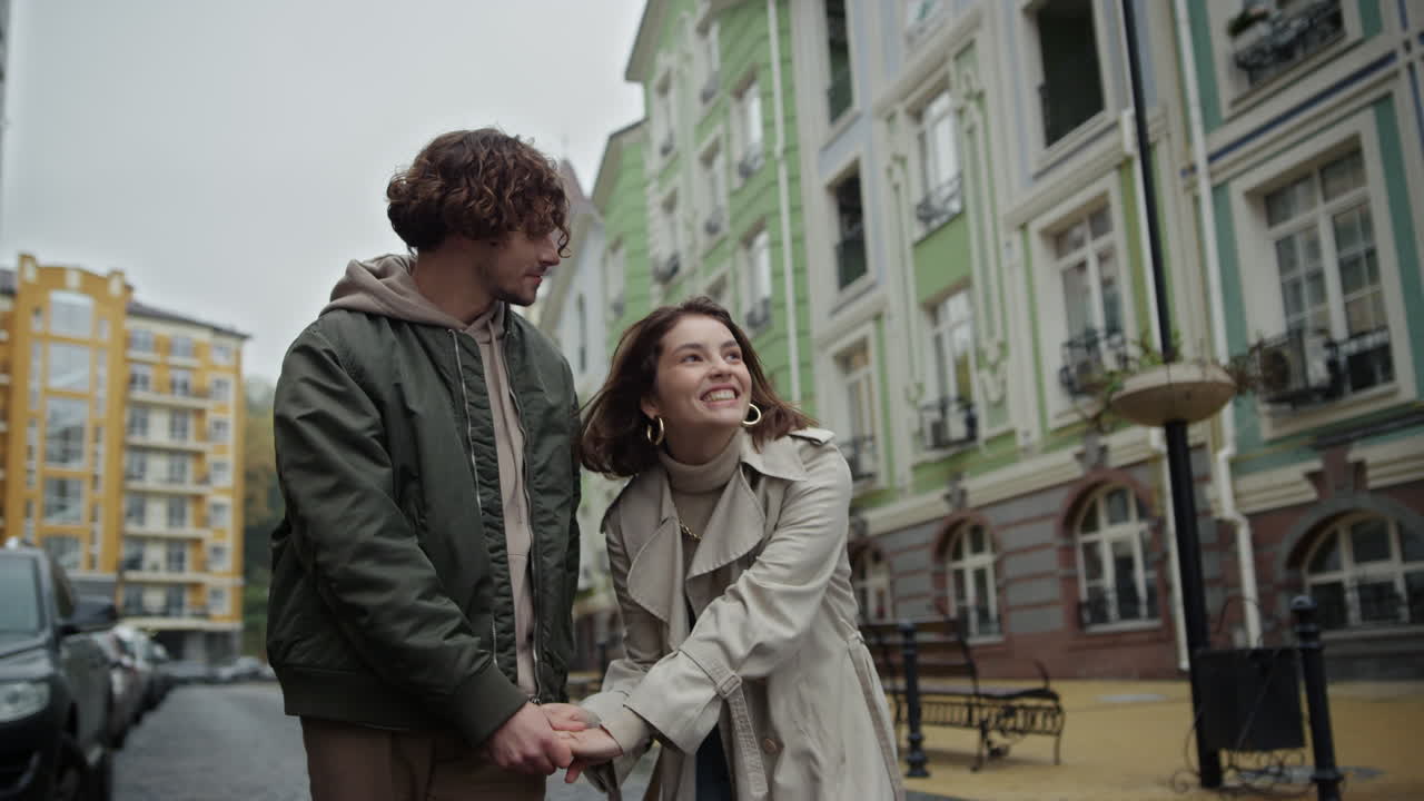 Love couple holding hands outdoor | Free Stock Video Footage