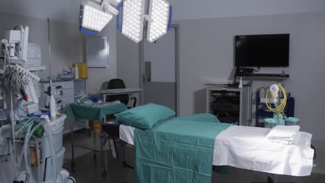 medical equipment and bed in hospital operating room, slow motion