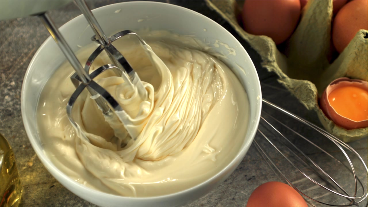 Preparing Homemade Mayonnaise with an Electric Mixer and Fresh Ingredients