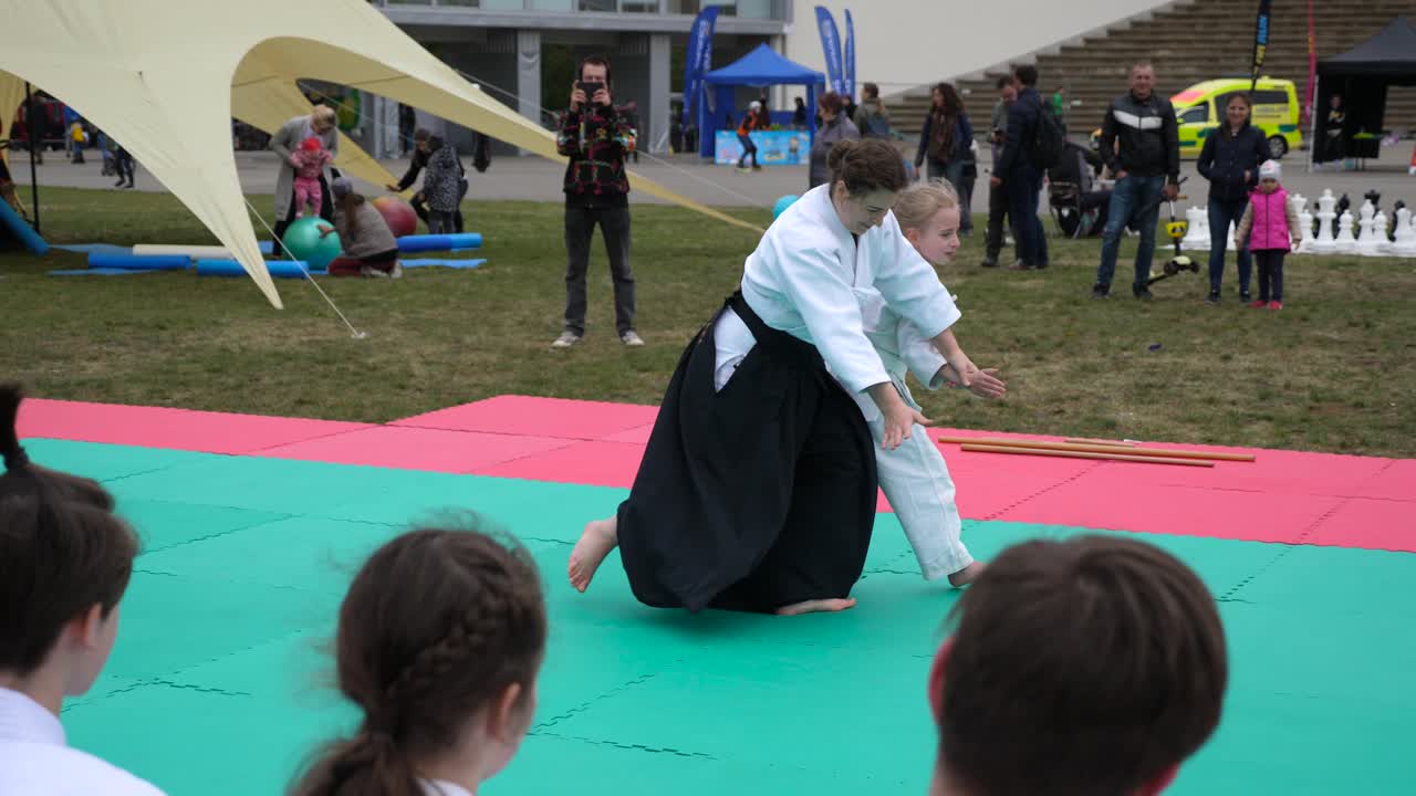 Aikido Training and Demonstration at an Outdoor Event