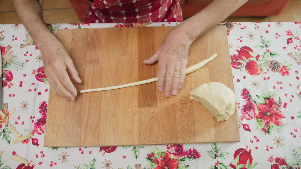 Man in Kitchen Preparing Traditional Italian Pasta