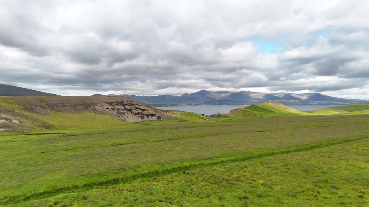 Aerial view of Hvalfjörður fjord in Vesturland Iceland, showing calm waters, surrounding mountains, and expansive Icelandic landscape from above