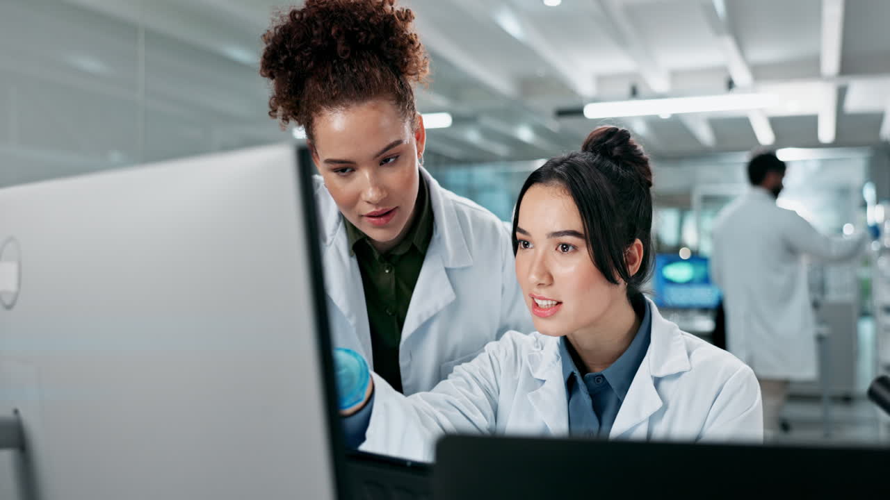 Two scientists working together in a lab