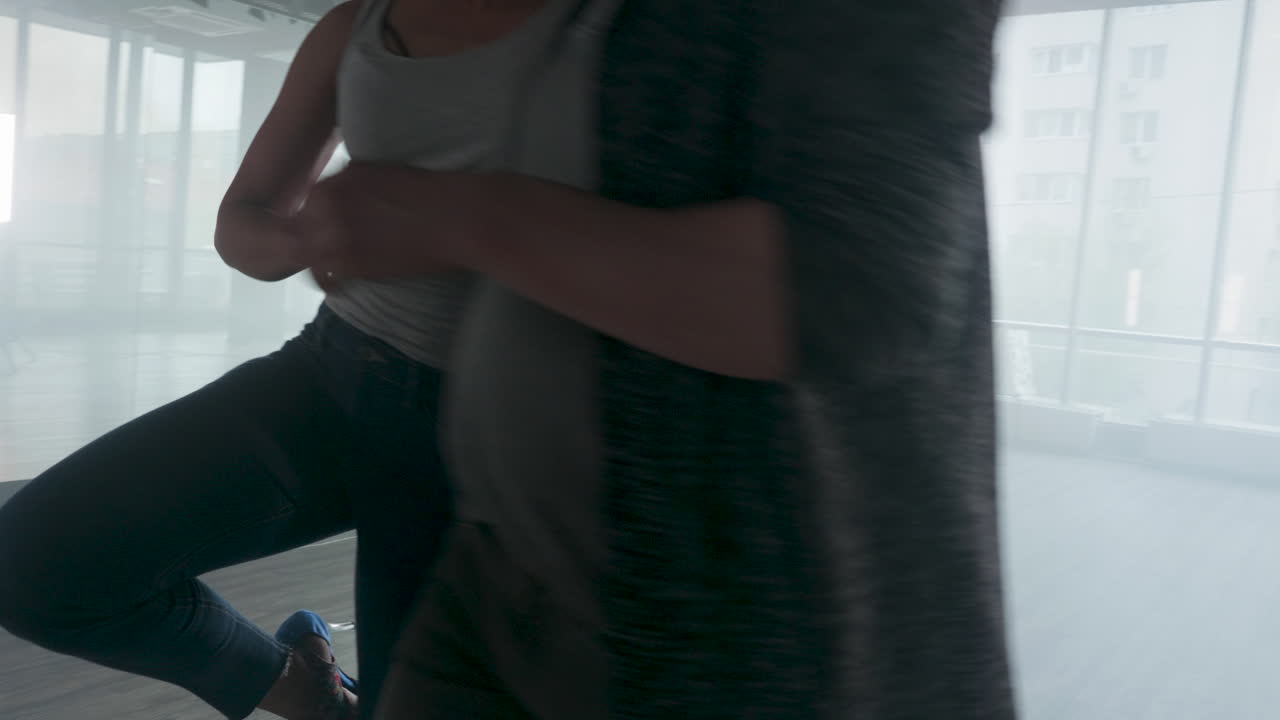 Couple dancing in studio