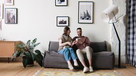 young couple on the sofa at home