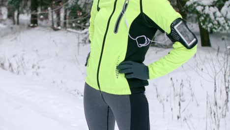 young woman warming up before running on the fresh air