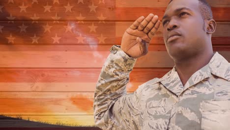 animation of african american male soldier saluting over american flag