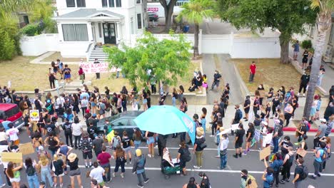 Aerial-Over-Crowds-Large-Black-Lives-Matter-Blm-Protest-March-Marching-Through-A-Small-Town-Ventura-California-5