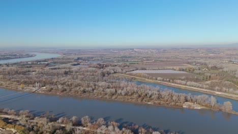 high aerial rising shot of the new bridge constructed at sorgues and sauveterre