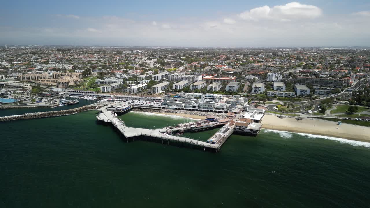 Aerial 4K drone footage of Redondo Beach Pier in Los Angeles, California, showcasing the Pacific Ocean, coastline, marina, and iconic waterfront landmark from scenic elevated views