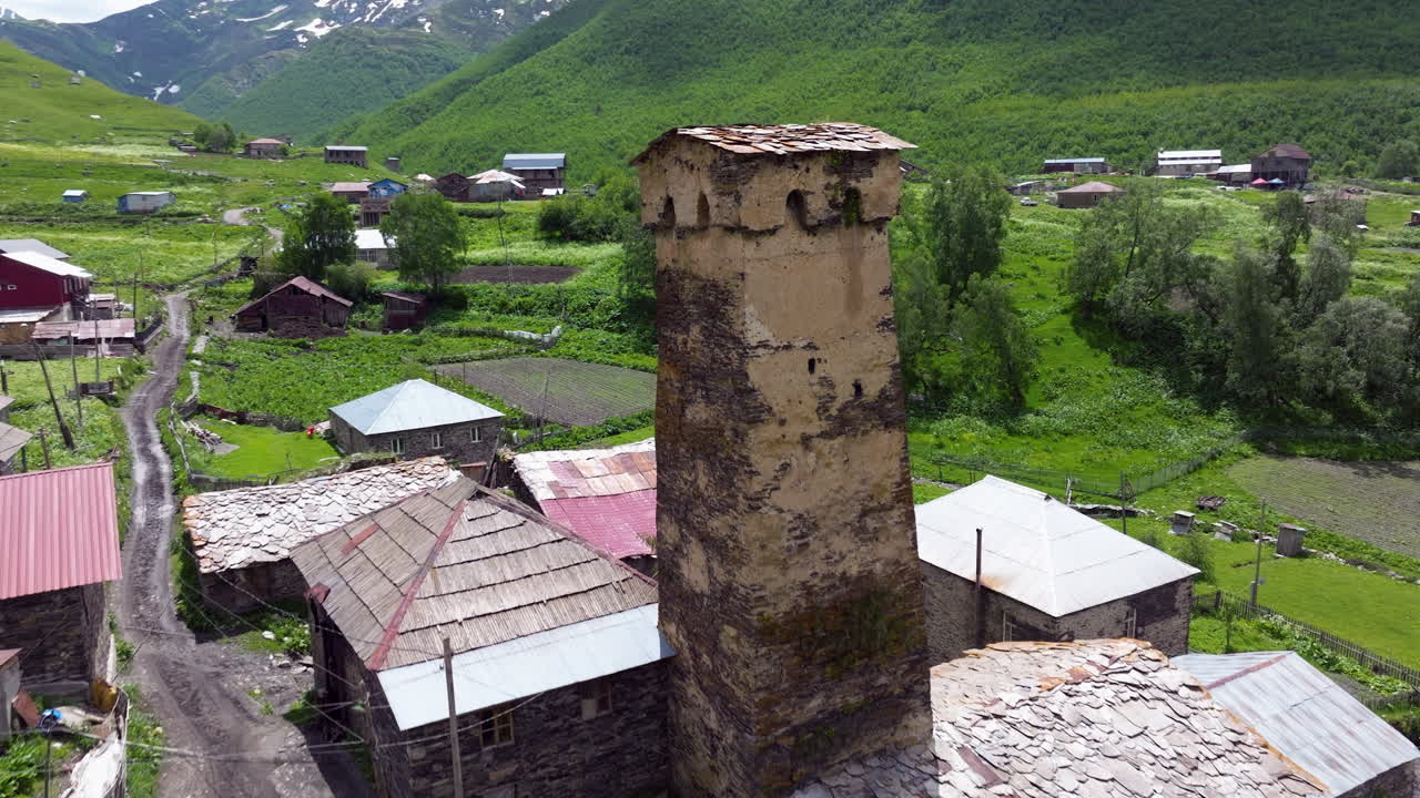 Ushguli Isolated Mountain Villages With Stone Tower in Upper Svaneti, Georgia. Aerial Closeup Shot