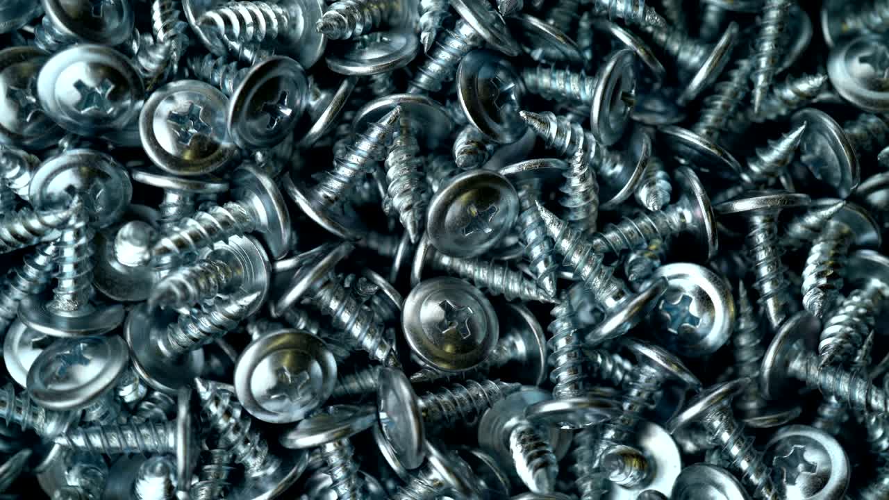 muchos tornillos de auto-tapeo rotan el fondo de movimiento