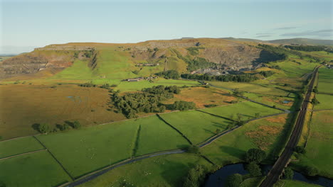 Establishing-Drone-Shot-Towards-Quarry-in-Yorkshire-Dales-at-Golden-Hour