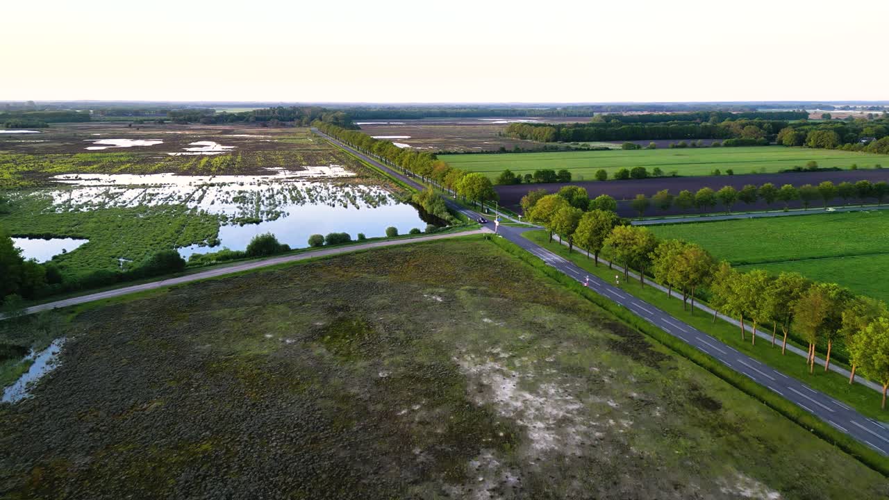 Aerial View of Dutch Countryside Crossroads with Marsh and Fields