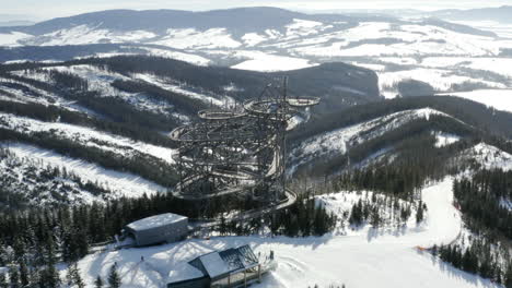 the sky walk lookout view from the top of a winter mountain,czechia