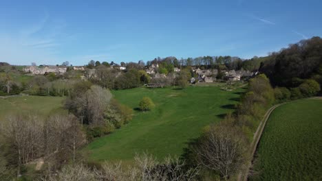 snowshill village low aerial spring season cotswolds gloucestershire landscape uk