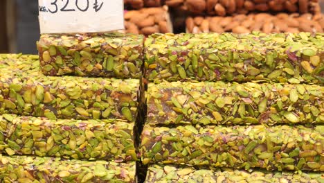 close up of delicious turkish delight covered in pistachios