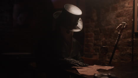 plague doctor in a dark room