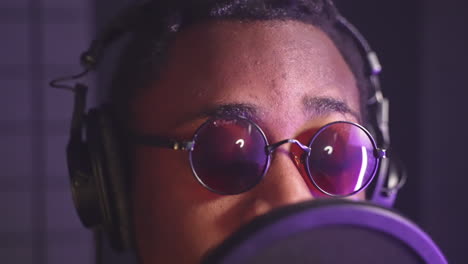 man recording music in a studio