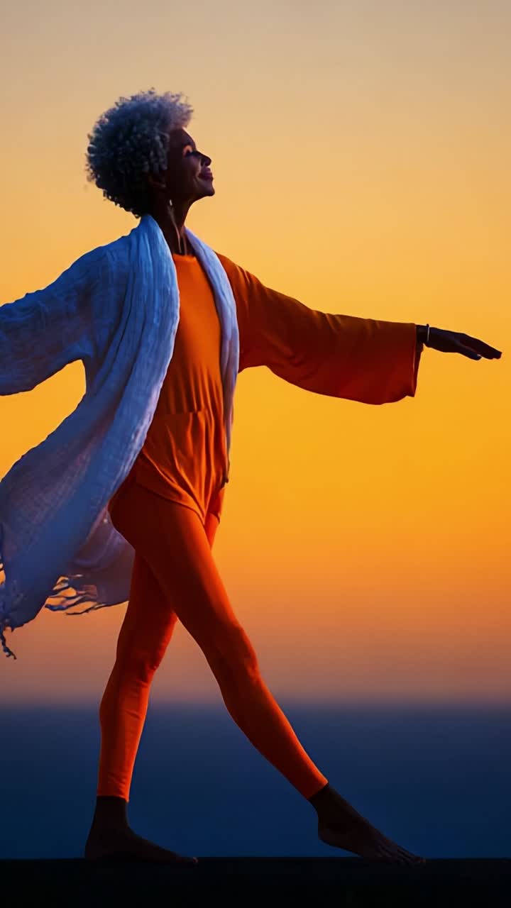 A Serene Silhouette of a Graceful Dancer in Orange Attire Against a Breathtaking Sunset Horizon, Capturing the Moment of Joyful Freedom and Expression