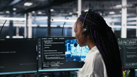 admin in data center wearing headset assisting users with ai