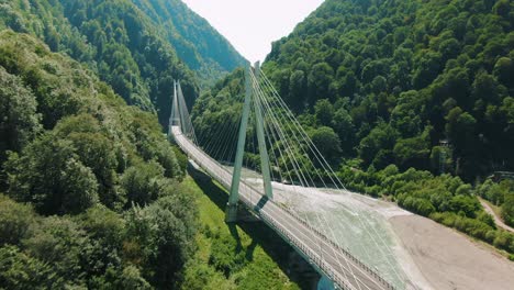 cable-stayed bridge in mountainous valley