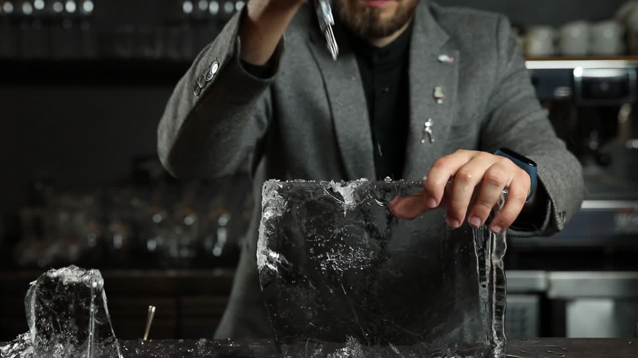 Bartender Carving Ice for Cocktails
