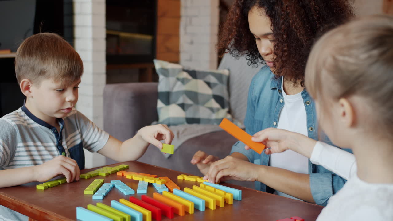 Children playing with colorful wooden blocks