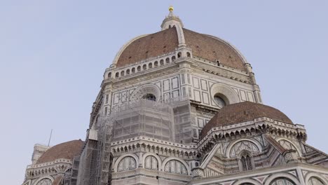 florence cathedral's dome seen from the street , tuscany, italy