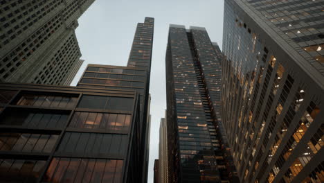 looking directly up at the skyline of the financial district