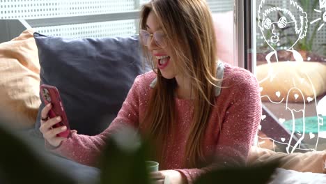 a relaxed woman in a cafe uses her smartphone for social media or messaging, with a contented smile while grabbing a coffee drink