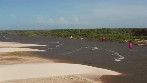 aerial: kitesurfing in the river delta of parnaiba, northern brazil