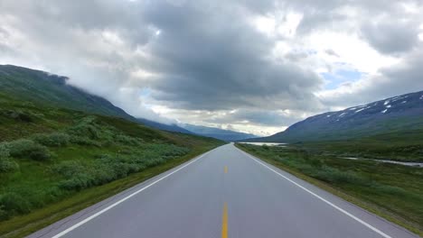 driving a car on a road in norway