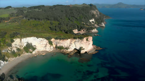 Drone-shot-over-Mares-Leg,-Coromandel-coastline,-New-Zealand