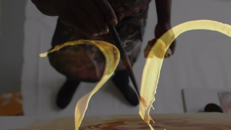 animación de un hombre afroamericano pintando sobre pintura