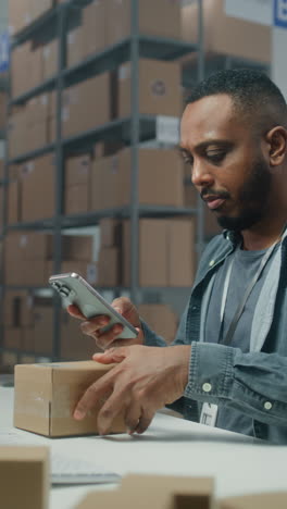 warehouse worker scanning package