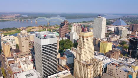 aerial of downtown memphis tennessee high rises skyscrapers businesses skyline stadium and mississippi river 2