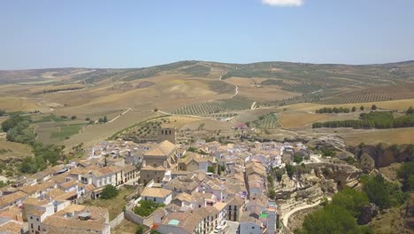 top view of the town of alhama de granada with many agriculture fields on the horizon