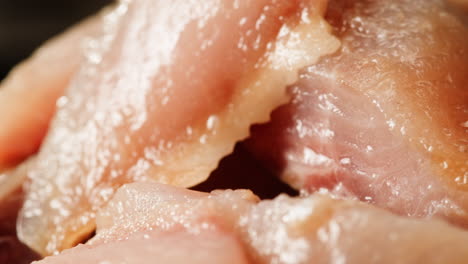 close-up of preserved fish or cured meat slices